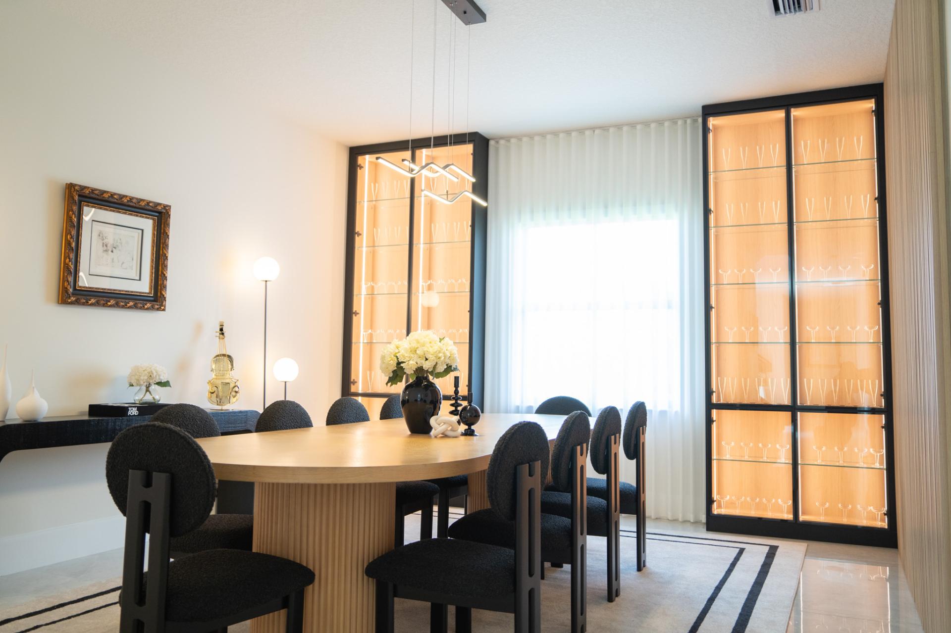 Illuminated dining room millwork and display cabinetry in Davie